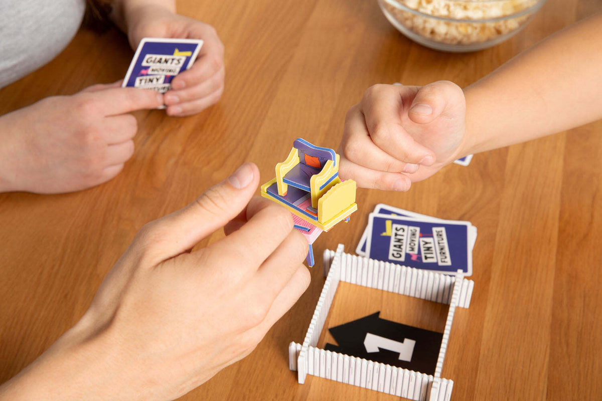 Giants Moving Tiny Furniture Party Game
